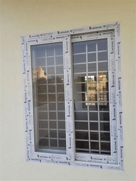 Track Office Upvc Glass Sliding Window At Rs Sq Ft