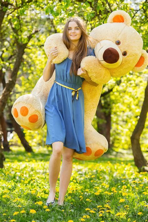 Girl With Teddy Bear Happy Girl With Big Teddy Bear Walking In Spring