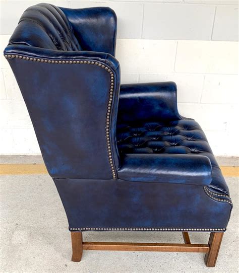 Pair Of English Hollywood Regency Blue Leather Wing Back Chesterfield