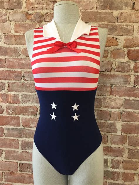 A Female Mannequin Wearing A Red White And Blue Swimsuit With Stars On It