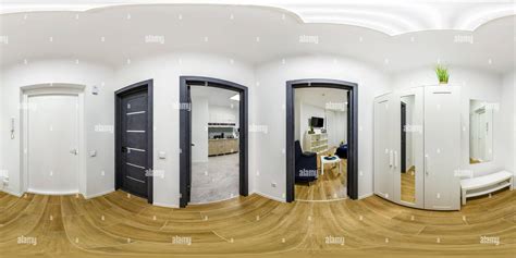 360° view of long white corridor in interior of entrance hall of modern