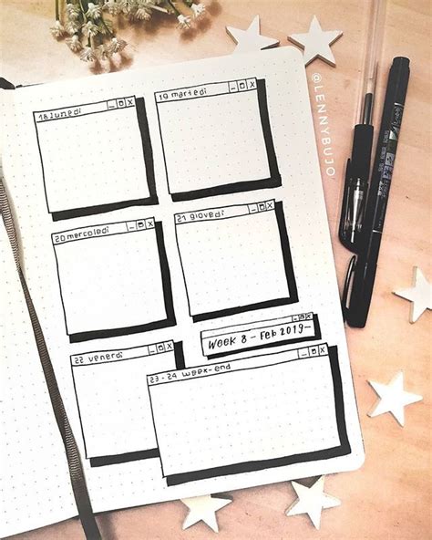 An Open Planner With Stars On The Table Next To It