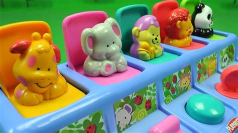 Poppin Toys Surprise Disney Baby Pop Up Pals Piano A Rainbow Of