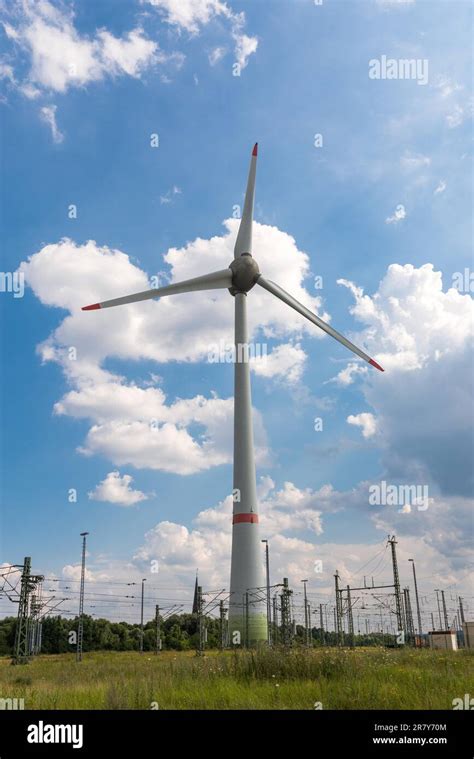 Wind Powered Electrical Generator In The Harbor District Of Hamburg