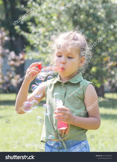 Happy Girl Inflates Big Soap Bubbles Stock Photo 2015428325 Shutterstock