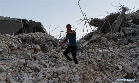 Palestinians Inspect Rubble Of Building In Gaza City Global Times