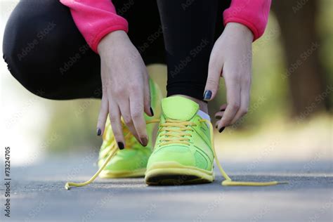 Runner feet on road, outdoors Stock Photo | Adobe Stock