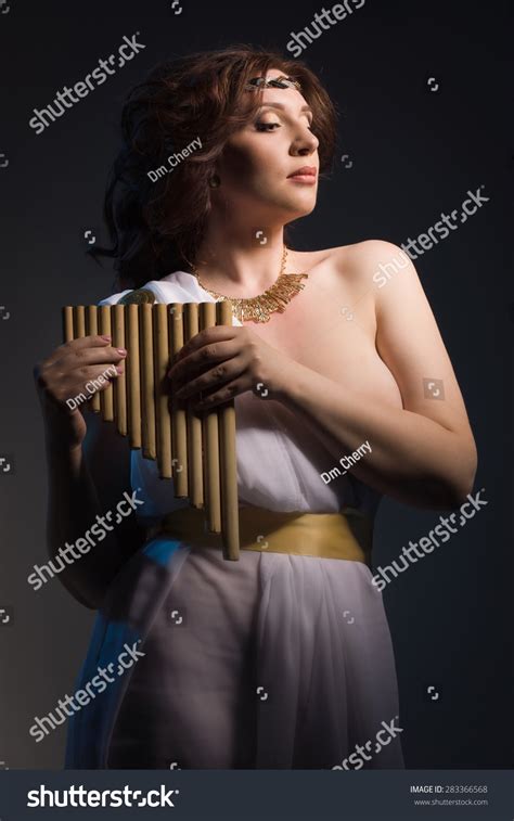 Beautiful Woman Wearing White Greek Toga Stock Photo