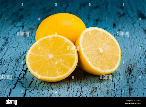 Lemon and cut half slices Stock Photo - Alamy