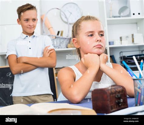 Sister Is Sitting Offended Stock Photo Alamy