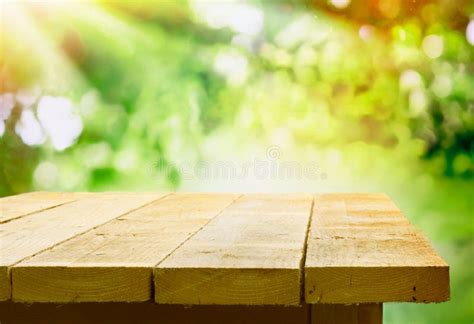 Empty Wooden Table with Garden Bokeh Stock Image - Image of display ...