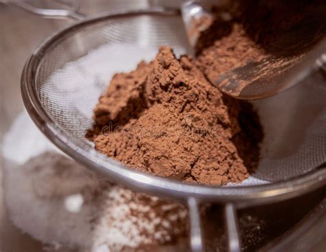 Pouring Cocoa Powder Into A Sieve Stock Photo Image Of Home Hungry