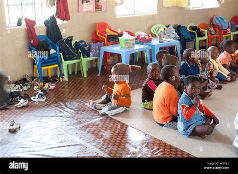 Group of black african children at school. Elementary classroom near Cape Town, South Africa ...