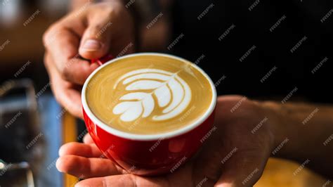 Premium Photo How To Make Coffee Latte Art By Barista Focus In Milk