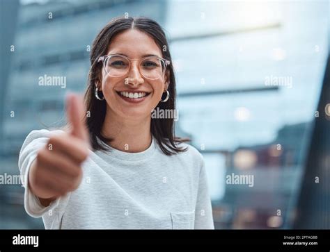 I Knew You Could Do It A Young Businesswoman Showing Thumbs Up Against