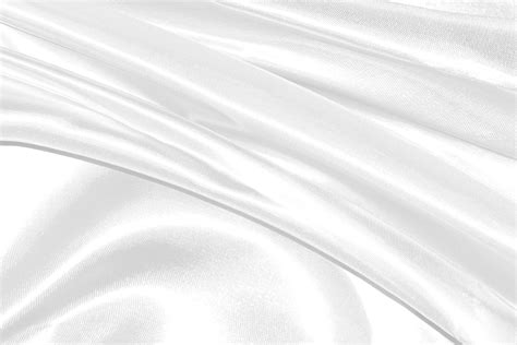 Closeup elegant crumpled of white silk fabric cloth background and ...