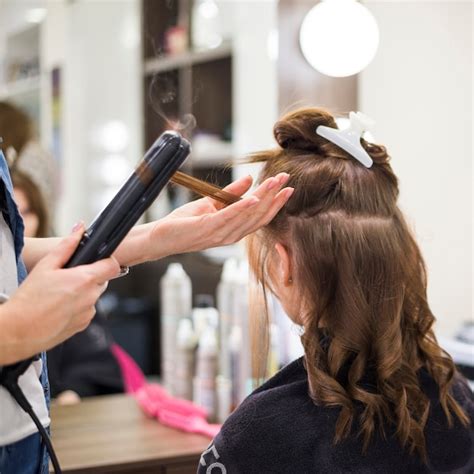 Premium Photo Brunette Woman Getting Her Hair Done