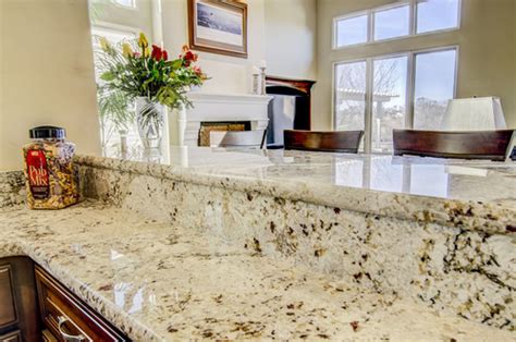 Snowfall Granite Countertops With Backsplash Design Ideas