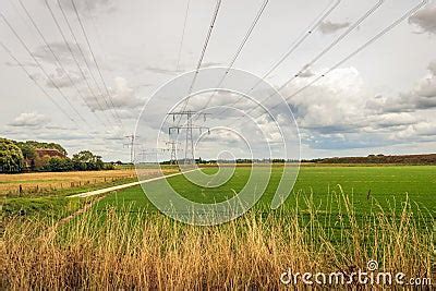 Dutch Polder Landscape With High Voltages Lines Royalty Free Stock