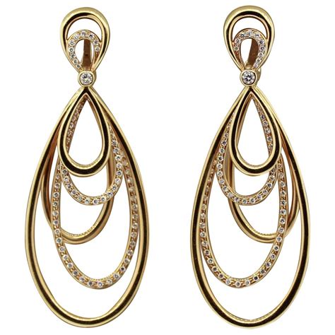 Diamond Dangle Gold Earrings at 1stDibs