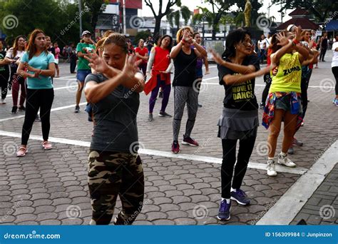 Adult Filipino Ladies Participate in a Zumba or Dance Exercise Class at ...