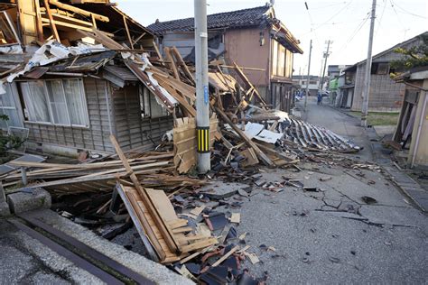 Scenes Of Loss Play Out Across Japans Western Coastline After Quake