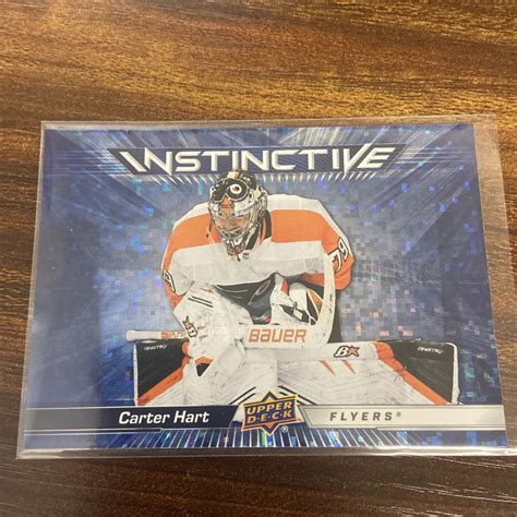 2023 24 UD Upper Deck Series 2 Instinctive Sparkle IN 24 Carter Hart