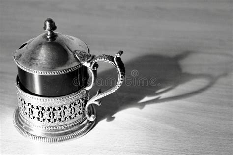 An Ancient Tea-pot Black and White with His Shadow Stock Photo - Image ...