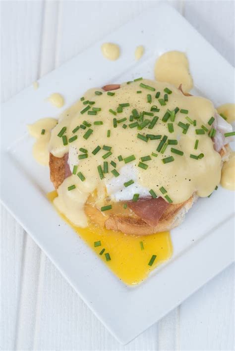 Eggs Benedict Toasted English Muffins Ham Poached Eggs and Hollandaise ...