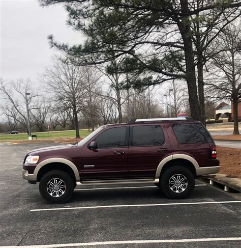 Maroon Ford Explorer Suv With 5 Tinted Windows