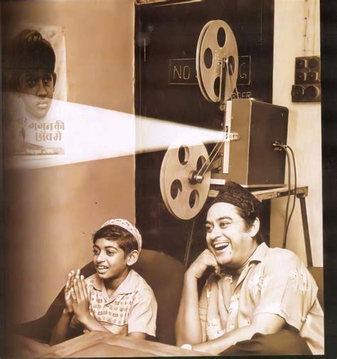 Download Timeless Bonding Of Kishore Kumar And His Son Wallpaper