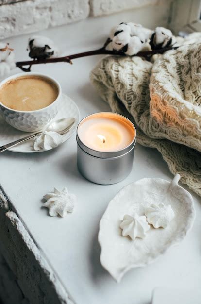 Premium Photo Cozy Winter Home Interior With Knitted Blanket And Candle