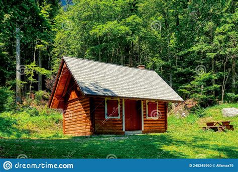 Log Cabin In The Trees By The Lake Fusine In Italy Stock Photo Image