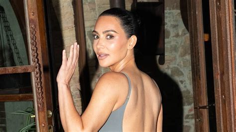 Kim Kardashian Flaunts Her Enviable Curves In Sheer Backless Grey Dress