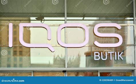 IQOS Store Neon Signboard. Close-up Of IQOS Logo Editorial Photo ...