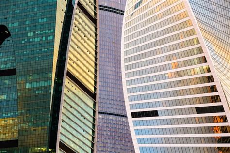 Premium Photo Low Angle View Of Sunset Reflected Off Office Buildings