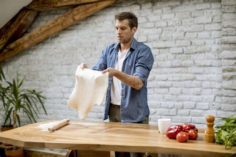 Young Man Making Dough In The Rustic Kitchen Stock Image Image Of