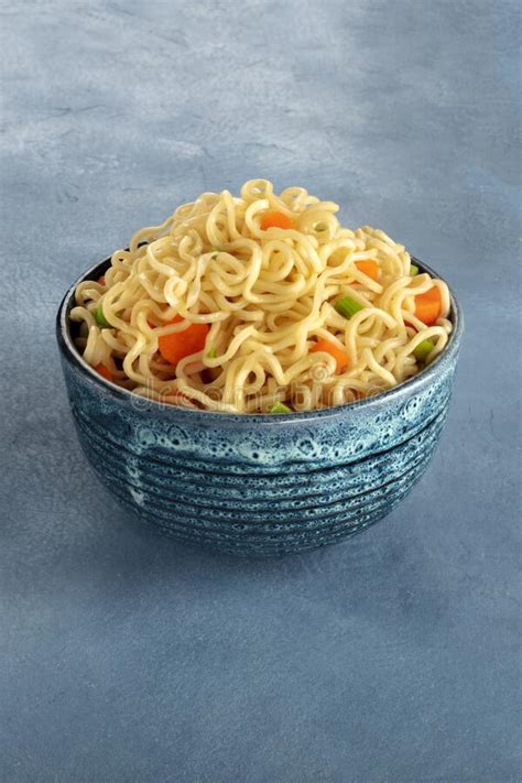 Instant Noodles With Carrot And Scallions On A Slate Background Stock