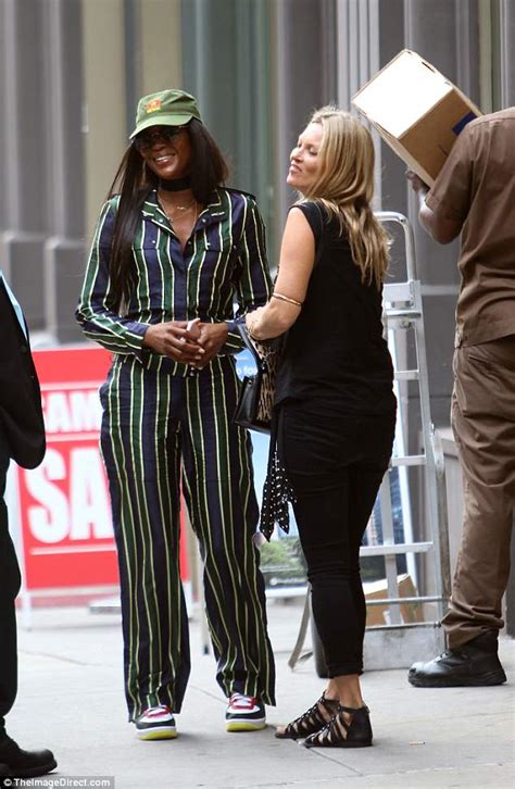 Kate Moss And Naomi Campbell Show Off Their Sartorial Flair As They Enjoy A Cigarette Break In