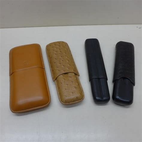 Two Cohiba Leather Cigar Cases And Two Other Leather Cigar Cases All