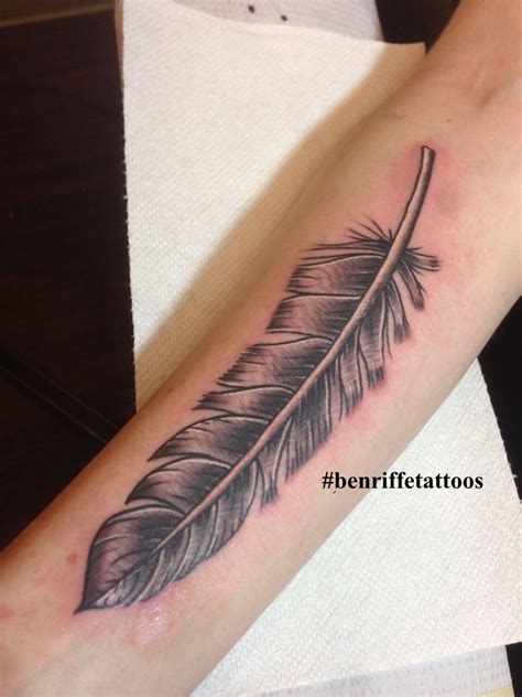 Black And Grey Feather Tattoo