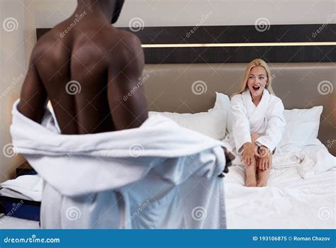 Surprised Woman Look At Naked Muscular Body Of Black Man Stock Image Image Of Housecoat