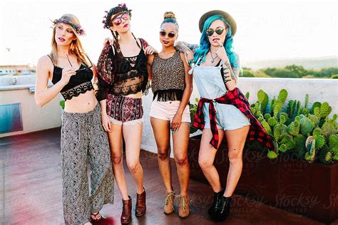 A Group Of Girl Friends Hanging Out Outdoors In The Sunlight Del