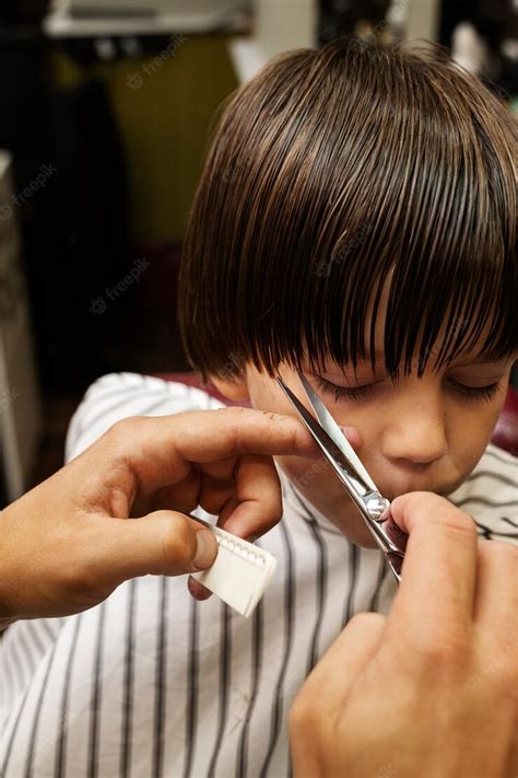 Free Photo High Angle Kid Getting Haircut