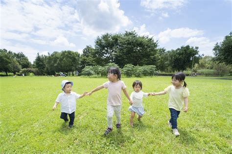 Premium Photo | Children walking hand in hand