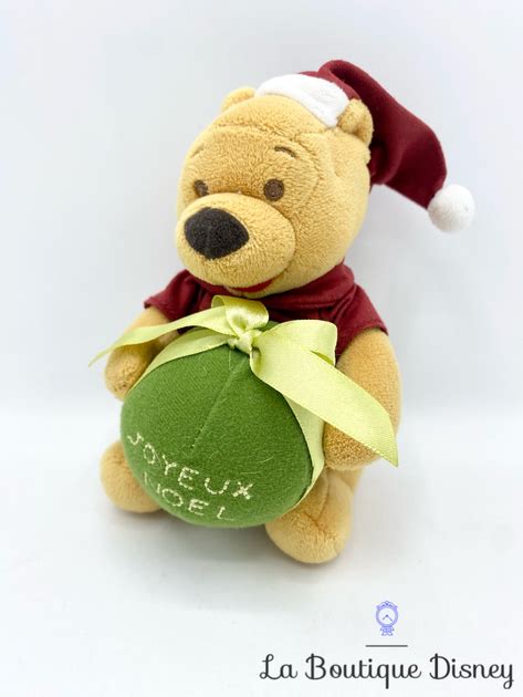 Peluche Winnie l ourson Joyeux Noël Disneyland Paris Disney boule 16 cm