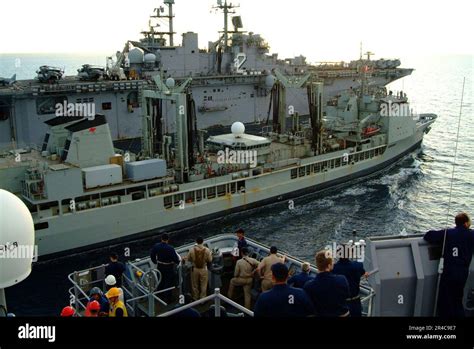 Us Navy The Amphibious Dock Landing Ship Uss Harpers Ferry Lsd 49 Comes Alongside The Royal