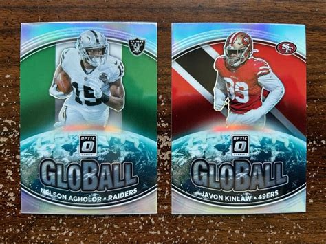 Nelson Agholor Javon Kinlaw Globall Holo 2021 Panini Donruss Optic