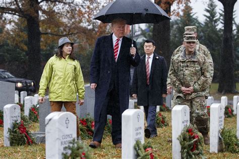 Trump Makes Unannounced Visit To Arlington National Cemetery The