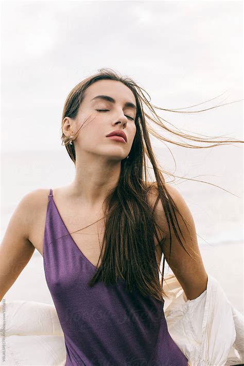 «beautiful Sensual Caucasian Woman Posing With Closed Eyes On Windy